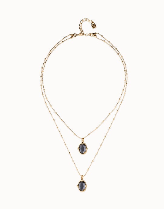 Multi strand necklace with two black oval faceted crystals